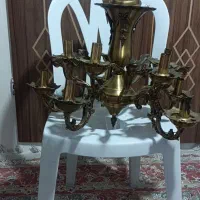 لوستر برنجی دوازده شاخه و دیوار کوب چهار شاخه