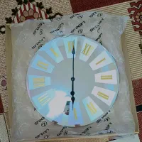 ساعت دیواری آینه‌ای