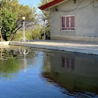 املاک بزرگ آرشین /فروش فوری باغ دینور معاوضه دارد