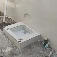 کاشی کاری و لوله کشی آب و فاضلاب