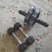 چرخ شکم خارجی و دمبل ۶گوش