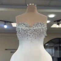 نیروی خانم برای  کار خیاطی تولیدی لباس عروس