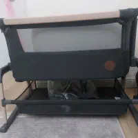 تخت کنار مادر کودک