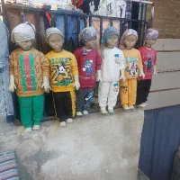 مانکن لباس بچگانه و چوب لباسی کریستال