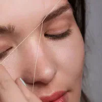 اصلاح صورت و ابرو با بند