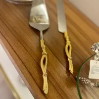 قاشق و چنگال سالاد خوری و کارد و کفگیر کیک بری