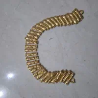 پیشه حدود ۱۵ گرم در حد نو