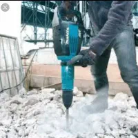 تخریب ساختمان گچ بتن دیوار کاشی حفاری با دستگاه