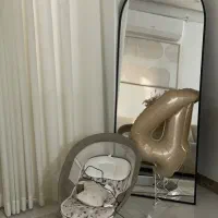 نینی لای لای برقی و تخت کنار مادر