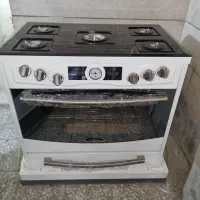 اجاق گاز نوژن صفحه شیشه نو جهیزیه