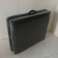 تخت تاشو چمدانی مناسب برای آرایشگاه و ماساژ و مطب