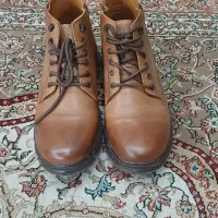 یک جفت پوتین مردانه