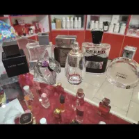 تعدادی شیشه خالی ادکلن اورجینال