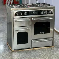 اجاق گاز طرح ۴ درب تکنوا صحفه استیل دیجیتالی
