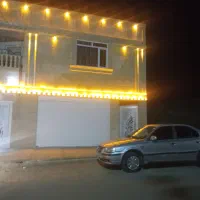 خانه به همراه مغازه تجاری