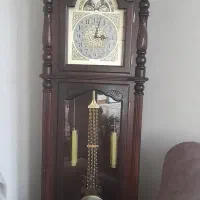 ساعت ایستاده و میز تلفن