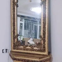 اینه و کنسول و ساعت ایستاده ست هستند
