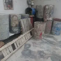 بشکه فلزی و تخته الوار ، چوب بست