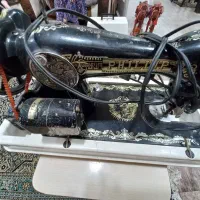 یک دستگاه چرخ خیاطی مارشال