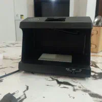 دستگاه تشخیص اصالت پول در حد نو