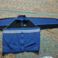 لباس گرم کن ورزشی
