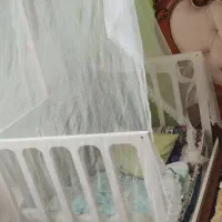 تخت گهواره کنار تخت مادر