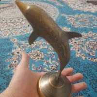 یک عدد دلفین کنده کاری شده جنسش ازمن هنردست خودم