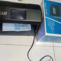 دستگاه تست اسکناس آک