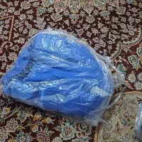 دو عدد کفش ایمنی و دو عدد لباس کار شرکتی