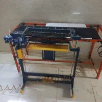 میز کار و استوپ منگنه و دریل و لامپ