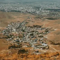 زمین بر جاده نظم آباد