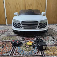 ماشین شارژی آئودی دو موتوره موزیکال نیاز به سرویس