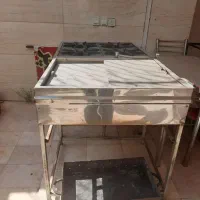 فردیزی و گاز۴شعله و هواکش صنعتی آشپزخانه