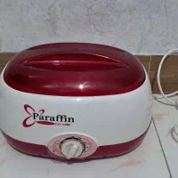 دستگاه پارافن تراپی و شیشه شیر