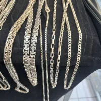 زنجیر گردنی و دستبند نقره به قیمت ساچمه