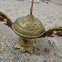 ساعت و شکلات خوری برنزی