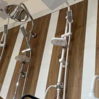 علم دوش دوکاره حمام