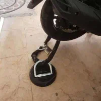 پایه قفل دیواری موتورسیکلت و دوچرخه