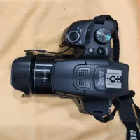 کنون 65 x