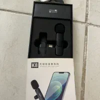 سه پایه و میکروفون