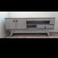تعدادی لوازم منزل مبل میز تلویزیون عروسک و