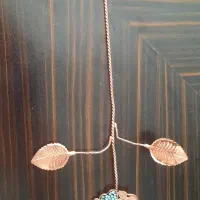 یک شاخه گل مسی ،فیروزه