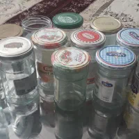 تعدادی شیشه مربا وترشی شسته وتمیز قیمت توافقی