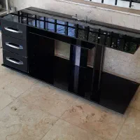 میز شیشه ای تلویزیون