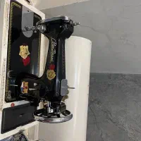 چرخ خیاطی گل قرمز
