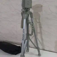 سه پایه دوربین شکسته