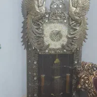 ساعت برنز سیاه قلم سنگین وزن