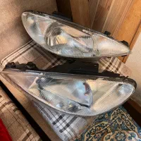 یک جفت چراغ جلو پژو 206 کبریتی درحد نو