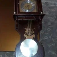 ساعت چوب پاندول دار زنگ خور