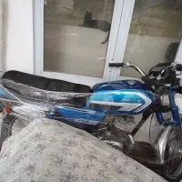 سوزوکی ax100